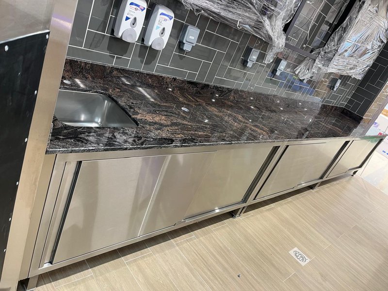 Customized metal-framed marble top unit